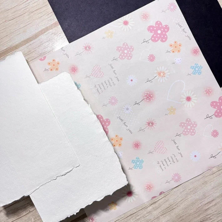 A Creative Notebook and Writing Supplies for Creating a Message to Your Future Self