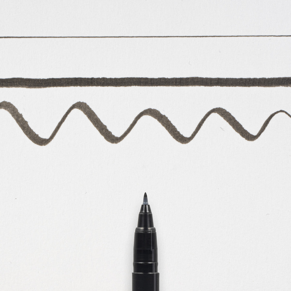 Čopičasto kaligrafsko pero SAKURA Pigma Brushpen Fine – črno